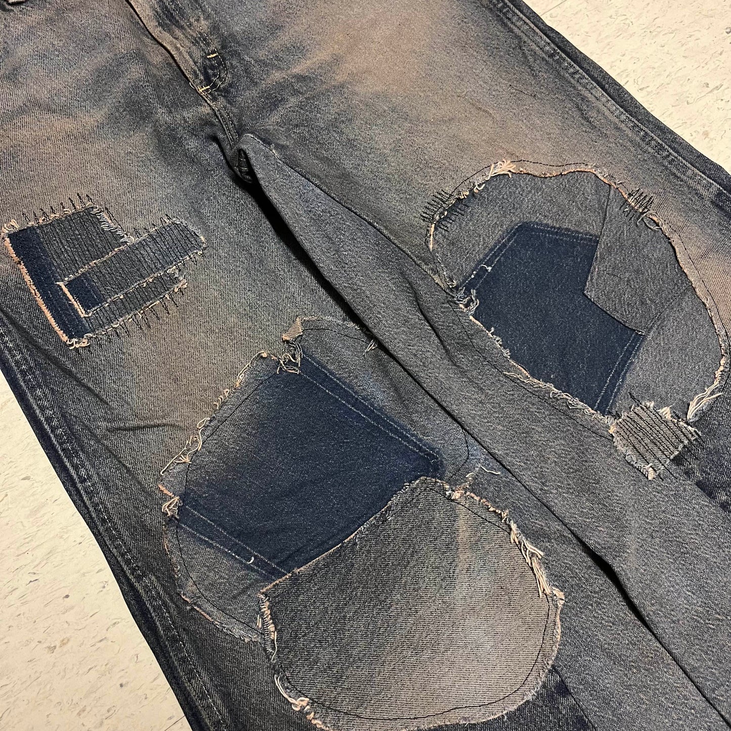 mud patched, repaired double knee wide leg baggy jeans